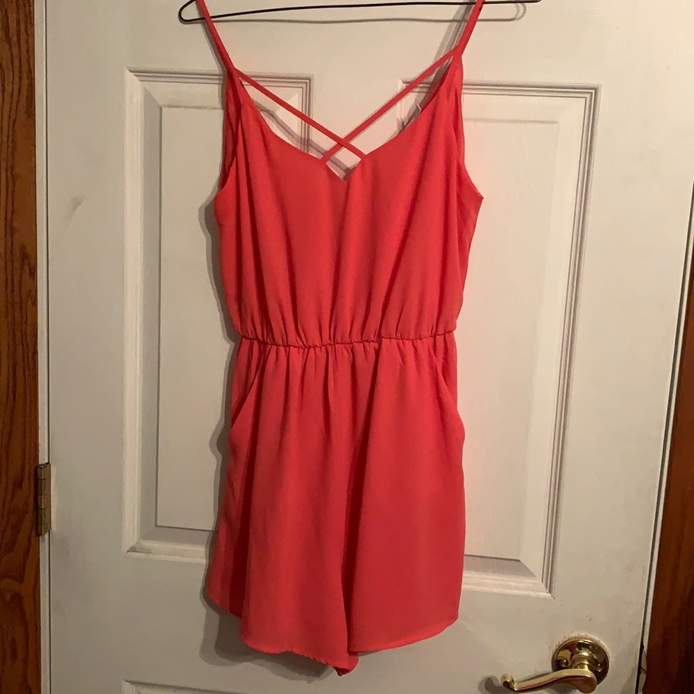 Cute pink Lush romper with pockets